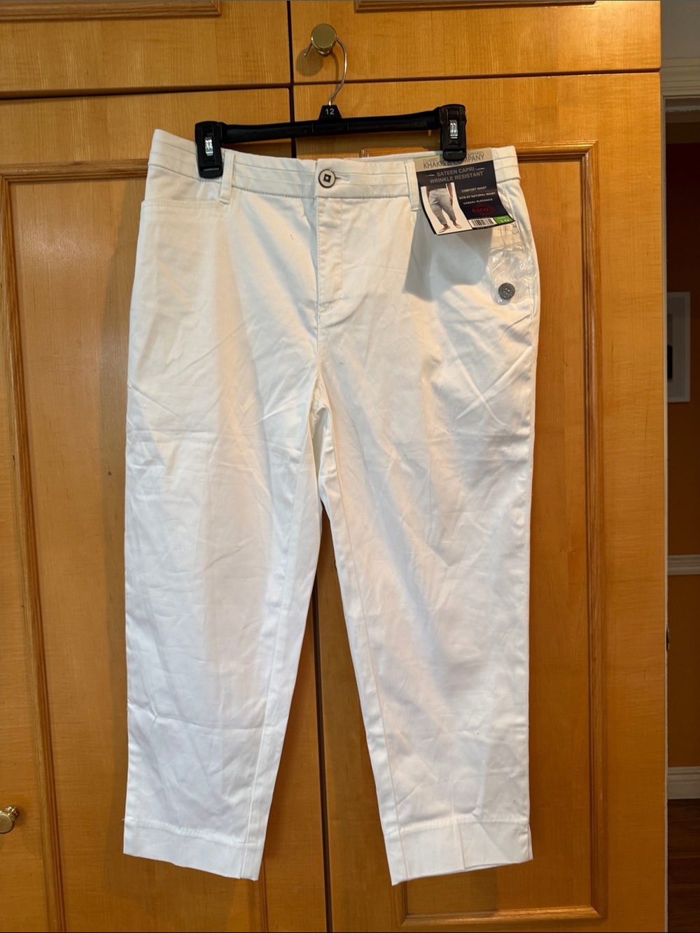 Classic White Capri Pants with Subtle Button Detail